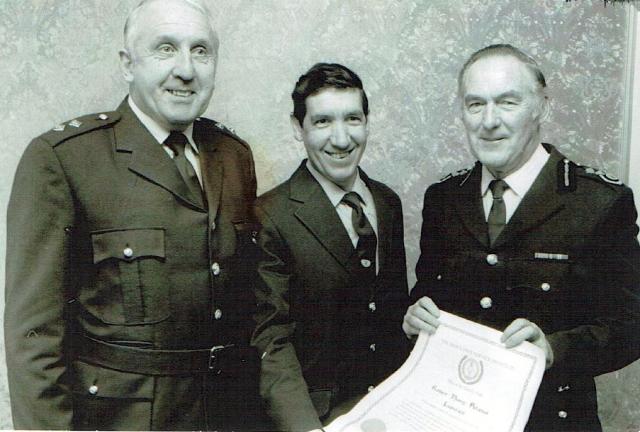 Mo Kemish and Bob Patience receive an award.