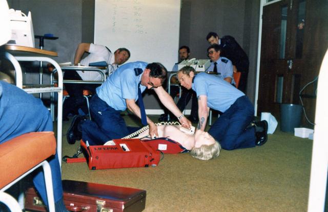 Delivery of a fatal shock while Roy Plenderlieth looks on.