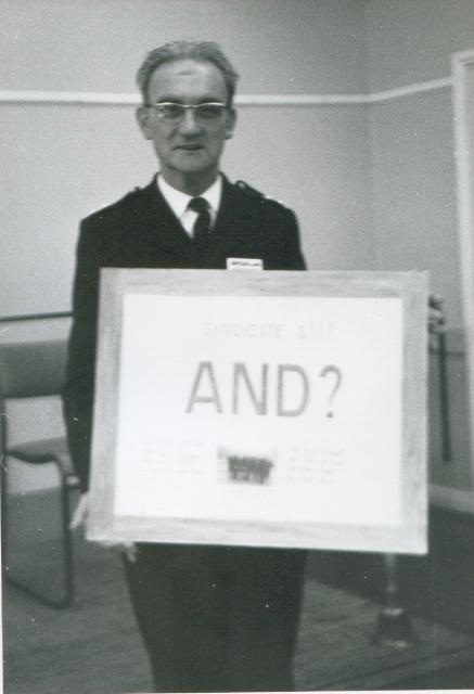 Les Pullinger with the 'AND' board.