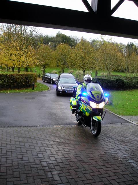 Funeral Cars Arrive.