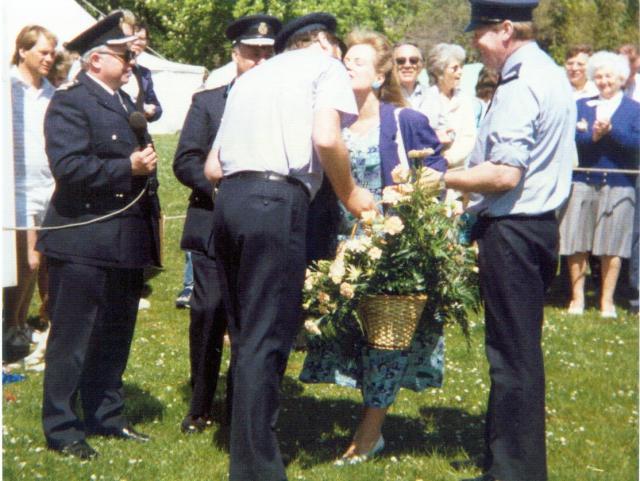 Mike 'Lofty' Robertson Presents Flowers to Sue Saville.