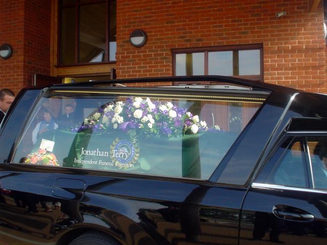Floral Tribute and Coffin Drape.