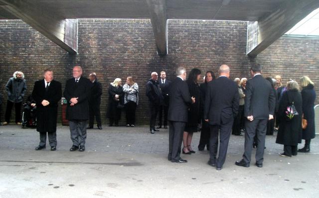 Mourners Gather.