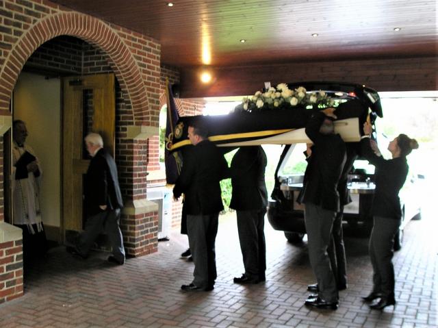The Coffin Arrives.