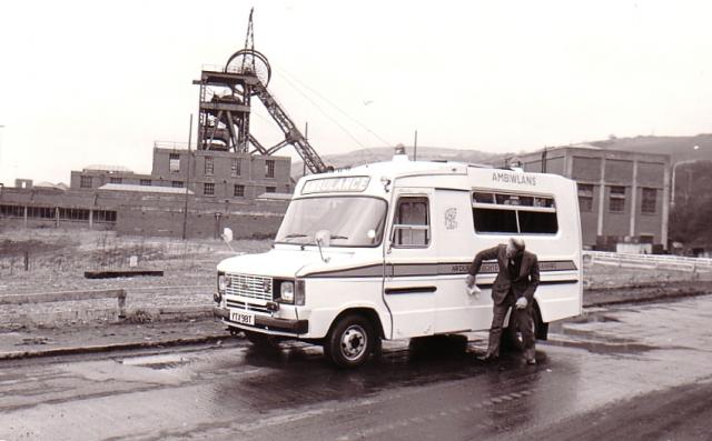 Whats Don Cook doing cleaning that welsh ambulance?. Reg 1978.
