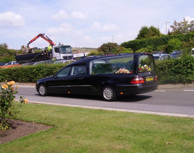 The hearse arrives at Portchester Crematorium.